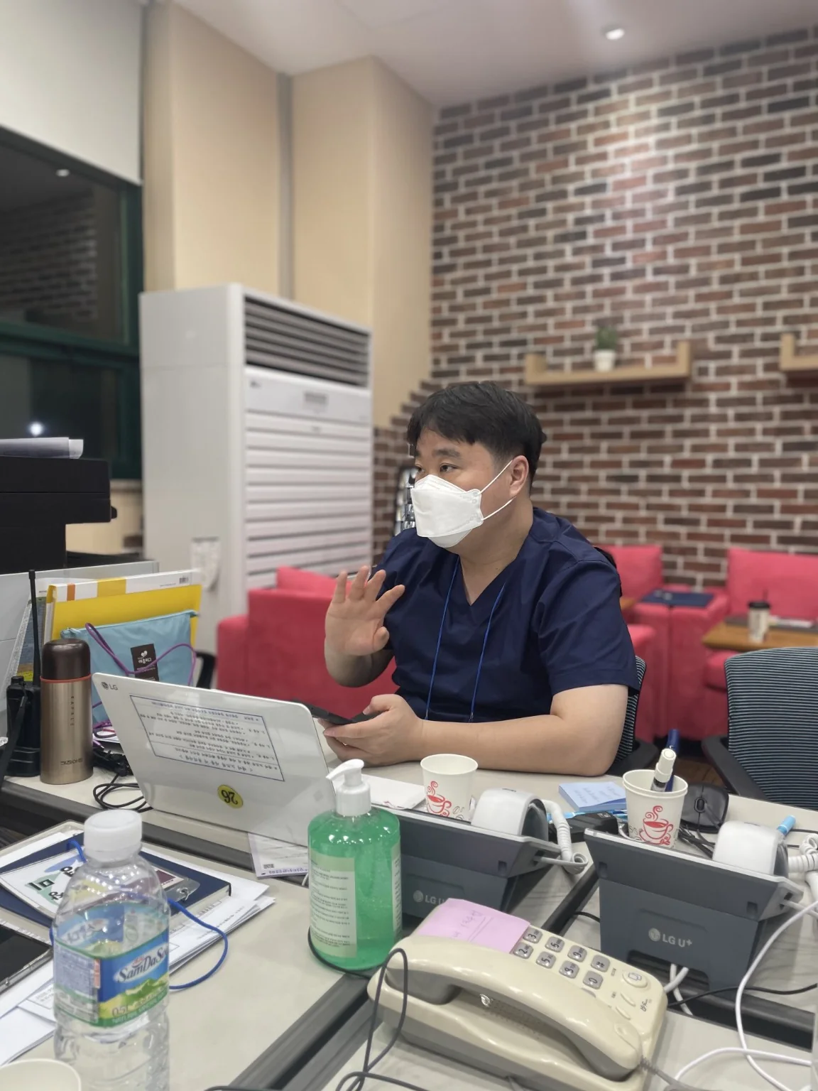 Inhyeok Yim working at a COVID-19 community treatment center
